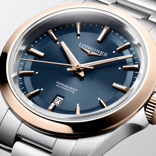 Montre Longines Conquest 30 mm Bleu Automatique Acier PVD Or Rose L3.320.5.92.6