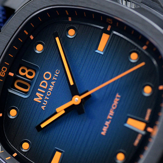 Montre Mido Multifort TV Grande Date 39x40mm bleue automatique acier finition PVD noire M049.526.37.041.00