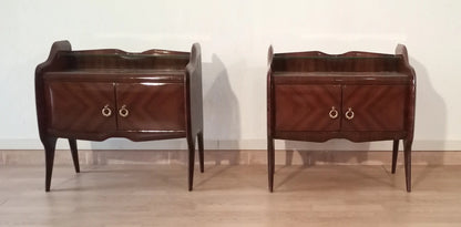 Pair of mid-century modern italiano wooden bedside tables with curved edges and brass handles in palissandro design