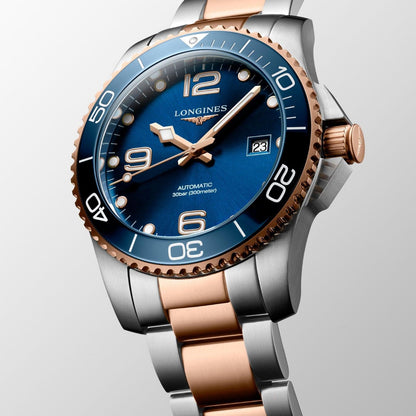Montre Longines HydroConquest 41mm bleu automatique acier finitions PVD or rose L3.781.3.98.7
