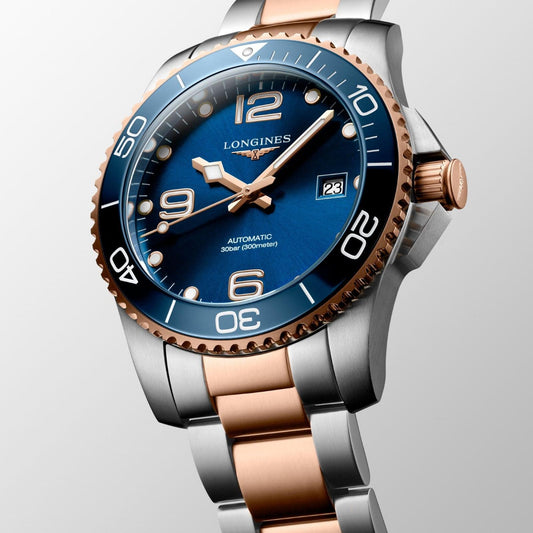 Montre Longines HydroConquest 41mm bleu automatique acier finitions PVD or rose L3.781.3.98.7