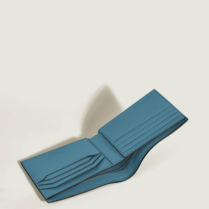 Montblanc portafoglio blu fumé in pelle blu fumé offre un design minimalista con otto scomparti e cuciture precise